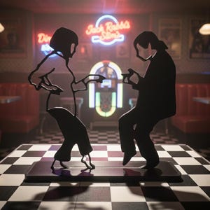 May include: A black metal sculpture depicting two figures dancing in a diner. The silhouettes are set against a backdrop of a jukebox, neon signs, and red booths. The sculpture is placed on a black and white chequered surface.