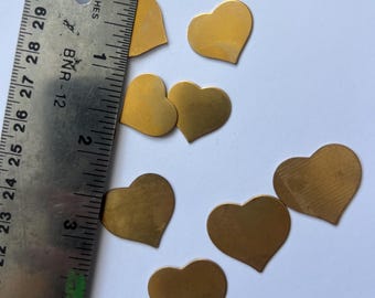 heart shaped brass discs. supply for stamping necklace. price is 25 for all 11 discs