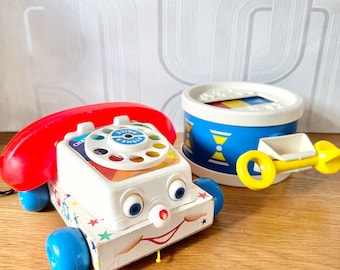 Vintage Fisher price toys. Telephone and drum. Sold separately