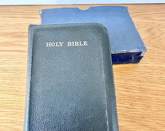 Oxford vintage Bible with blue edge pages & zip case in original cardboard sleeve.