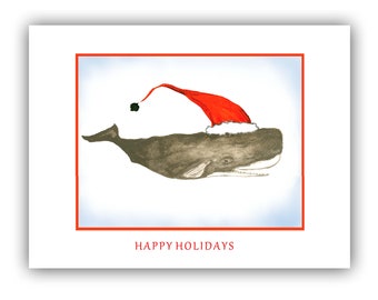 May include: A watercolor illustration of a whale wearing a red Santa hat with a white trim. The whale is swimming in a light blue background with a red border. The text "HAPPY HOLIDAYS" is printed below the whale.