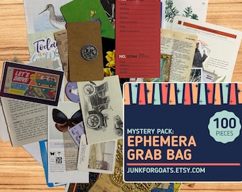 May include: A collection of assorted paper ephemera including vintage postcards, book pages, a red shipping tag, a brown card with a metal fastener, and a blue graphic sign reading Mystery Pack: Ephemera Grab Bag 100 Pieces Junkforgoats.etsy.com.