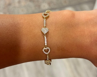 Pulsera de eslabones de corazón dorado