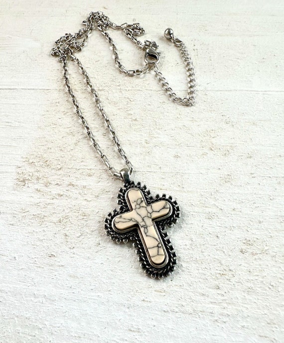 Ivory cross necklace discount