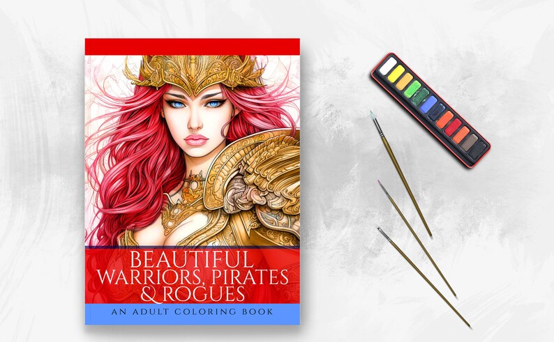 May include: An adult coloring book titled "BEAUTIFUL WARRIORS, PIRATES & ROGUES" featuring a detailed illustration of a woman with red hair and gold armor. A watercolor paint set and paint brushes are also present.