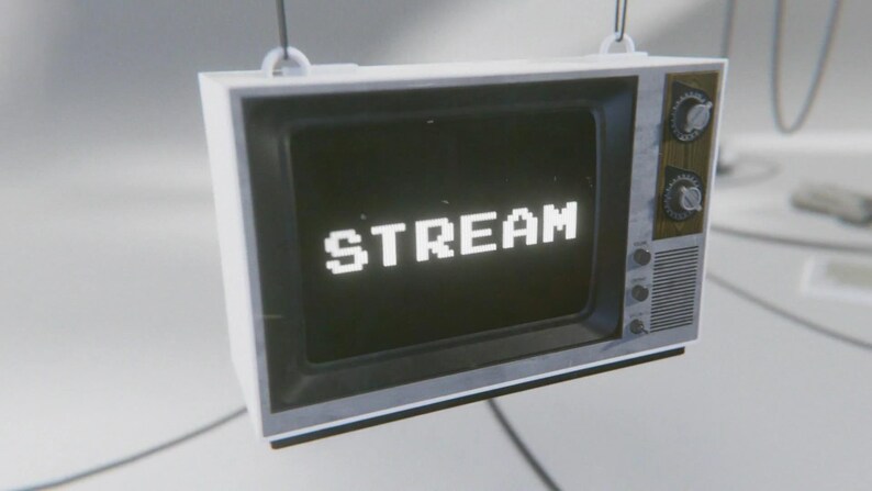 May include: A vintage television set with a black and white screen displaying the word "STREAM" in white pixelated letters. The television is hanging from the ceiling and has a wooden side panel with knobs.