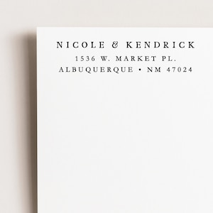 Modern three line return address stamp. Simple serif font on red rubber mounted on a beautiful blond wood block with handle. Black ink pad is optional. Perfect gift for wedding, housewarming, birthday or holiday giving.