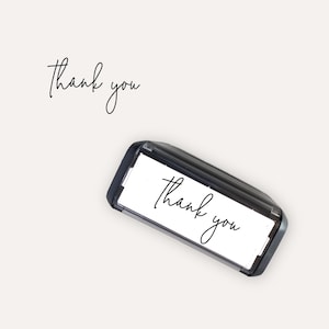 May include: A set of three ceramic nesting bowls in shades of blue, green, and white. The bowls feature a speckled glaze and a simple, modern design. The largest bowl is approximately 7 inches in diameter.