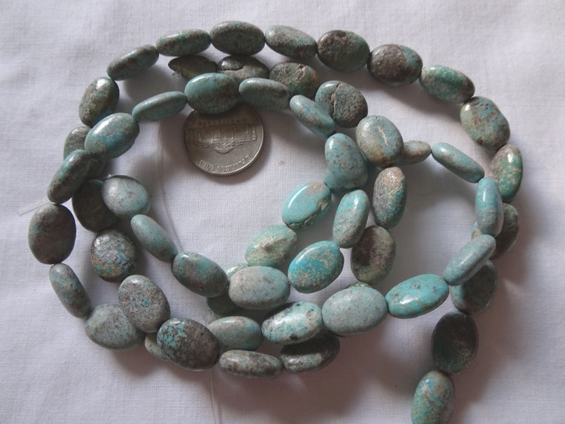 14 14 Strand Turquoise Puffy Oval Stone Beads 13-13.5mm Long A432