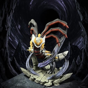 May include: A detailed figurine of a creature with a white, yellow, and red color scheme, set against a dark, cavernous background. The figure has multiple arms and a dynamic pose, standing on a cracked stone base.
