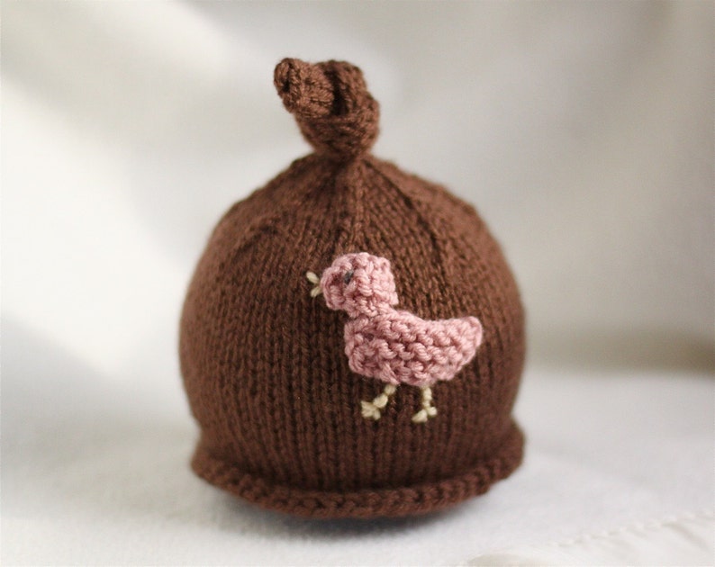 Sizes newborn to big kid available. Baby girl or boy knit hat with bird applique
