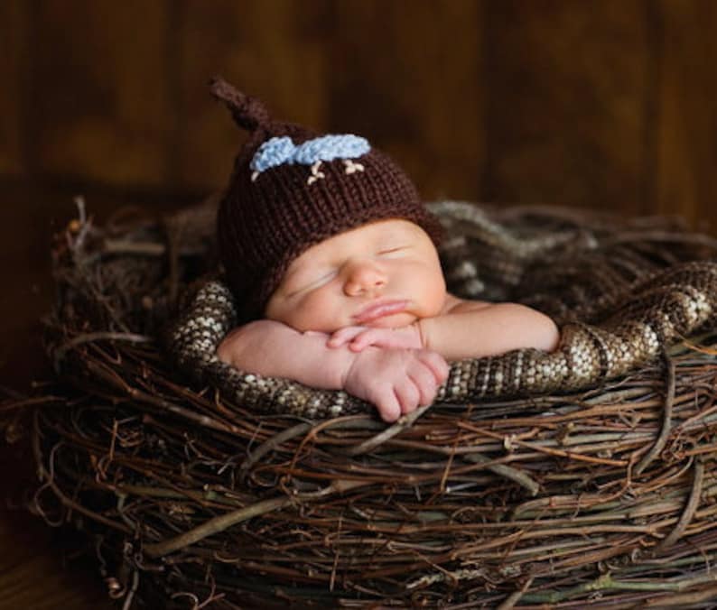 Sizes newborn to big kid available. Baby girl or boy knit hat with bird applique