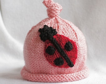 baby girl hand knit hat with ladybug applique.  sizes newborn-big kid available.