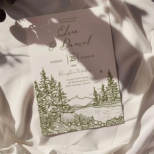 May include: A wedding invitation with a landscape illustration in olive green ink. The invitation includes the names "Elica & Daniel", the date "June 25, 2026", and the reception details at Crystal Golf Course in Chicago.