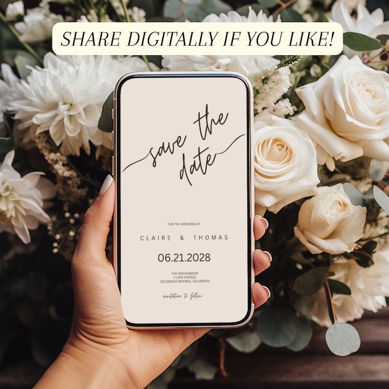 This is a mockup image of a women's manicured hands holding a phone - the screen is visible with a wedding save the date central to the photo. The background is of large cream, neutral roses. Text at the bottom reads - share digitally if you like. This invite is in beige and espresso brown fonts.