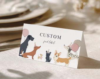 May include: A folded card with the text "CUSTOM food label" and illustrations of various dog breeds wearing party hats and holding balloons. The dogs are in different colors and poses, creating a festive design.