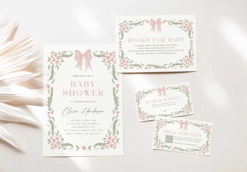 May include: Baby shower invitation suite with a floral design. The invitation and accompanying cards feature a pink bow and floral border. The invitation includes the text "Baby Shower" and event details. The suite includes cards for books, diaper raffle, and gifts.