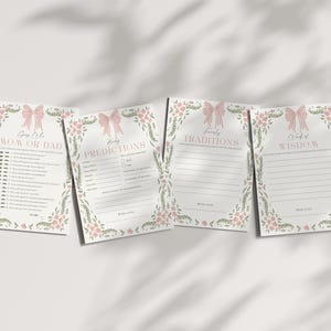 May include: Four baby shower game cards with floral and bow designs. The cards include the phrases "Guess Who Mom or Dad", "Baby Predictions", "Family Traditions", and "Words of Wisdom". The cards are white with pink and green accents.