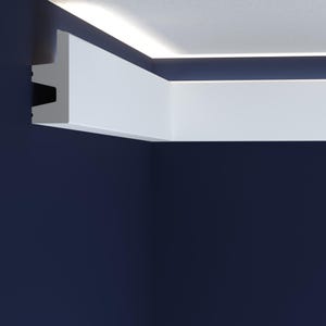 May include: White ceiling molding with a recessed light fixture. The molding is installed in a corner of a room with a dark blue wall.