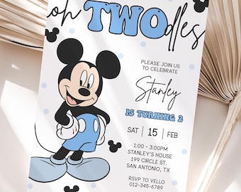 May include: A blue and white birthday invitation with Mickey Mouse. The invitation says "Oh Two-dles" and "Stanley is turning 2". The invitation includes the date, time, and location of the party.
