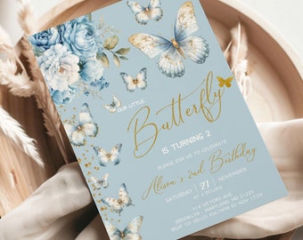 May include: A blue and gold invitation card with a butterfly theme. The card features a watercolor illustration of butterflies and flowers. The text on the card reads "Our Little Butterfly is Turning 2. Please join us to celebrate Alison's 2nd Birthday. Saturday | 27 November at 2 o'clock. 914 Victory Ave. Brooklyn Maryland, MD 21225. RSVP to Vello 456 7890 by Nov 17th."