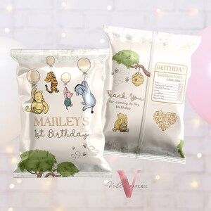 May include: Two white party favor bags with Winnie the Pooh characters and balloons. One bag says "Marley's 1st Birthday" in gold lettering. The other bag says "Thank You for coming to my birthday".