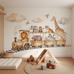 May include: A charming wall mural depicting a train with safari animals such as a lion, elephant, tiger, zebra, and giraffe. The design includes clouds and birds, perfect for a nursery or children's room, creating a playful theme.