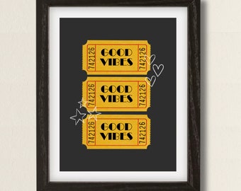 May include: Three yellow ticket-shaped prints with the text "Good Vibes" in black and red lettering on a dark gray background. The tickets have the number "742126" printed on each side.