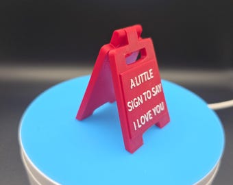 Cute little (2.25inch) sign for your significant other. Fits inside a card (see pics)