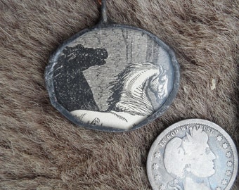 Black and white horse heads - reversible glass pendant