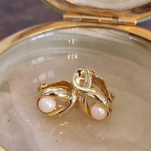 Pair of vintage gold earrings