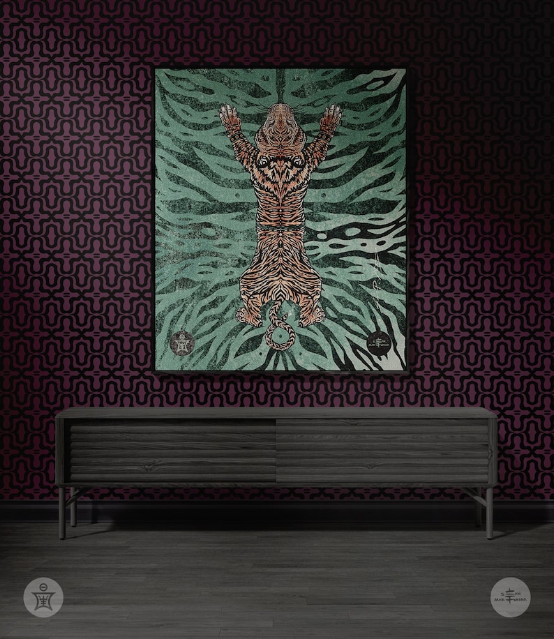 May include: A black and gray wooden cabinet with two doors sits in front of a dark purple wall with a geometric pattern. A framed print of a tiger with a green and blue background hangs above the cabinet.