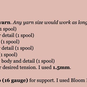 May include: Text on a pink background lists materials for a craft project. The materials include size 8 thread yarn in various colors: red, light brown, black, light cream, blue, and dark brown. It also lists hooks, a sewing needle, and wire.