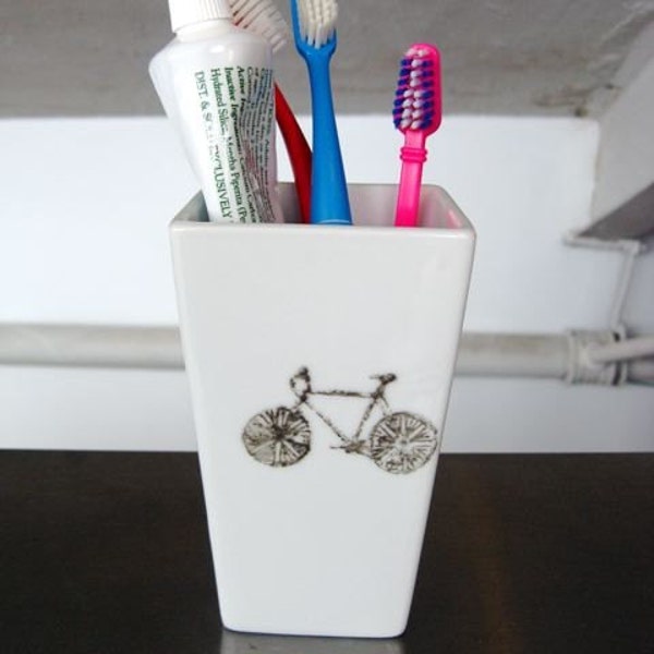 Silver bicycles toothbrush caddy