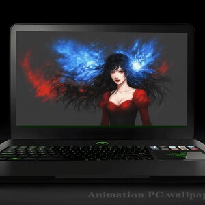 May include: A black laptop computer with a green backlit keyboard and a touchpad. The screen displays an animated wallpaper of a woman with long black hair and a red dress, surrounded by blue and red flames.