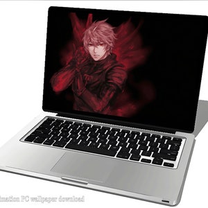 May include: A silver laptop computer with a black keyboard and trackpad. The screen displays an anime-style image of a young man with pink hair in a red and black outfit.