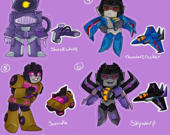 G1/IDW Transformers iriserende bedels met bijpassende sticker