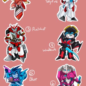 G1/IDW Transformers Iridescent Charms with random sticker