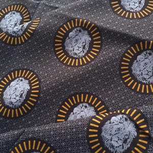fabric with lion's head motif