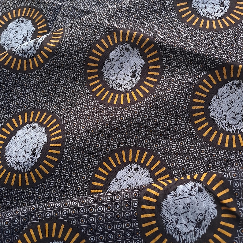 fabric with lion's head motif