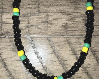 Zwarte, gele en groene kralenketting Jamaicaanse vlag