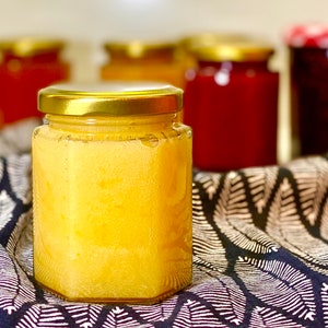 Homemade lemon curd jam, preserve, fruit spread with apricot, plum, blackberry and Buddha&#39;s hand