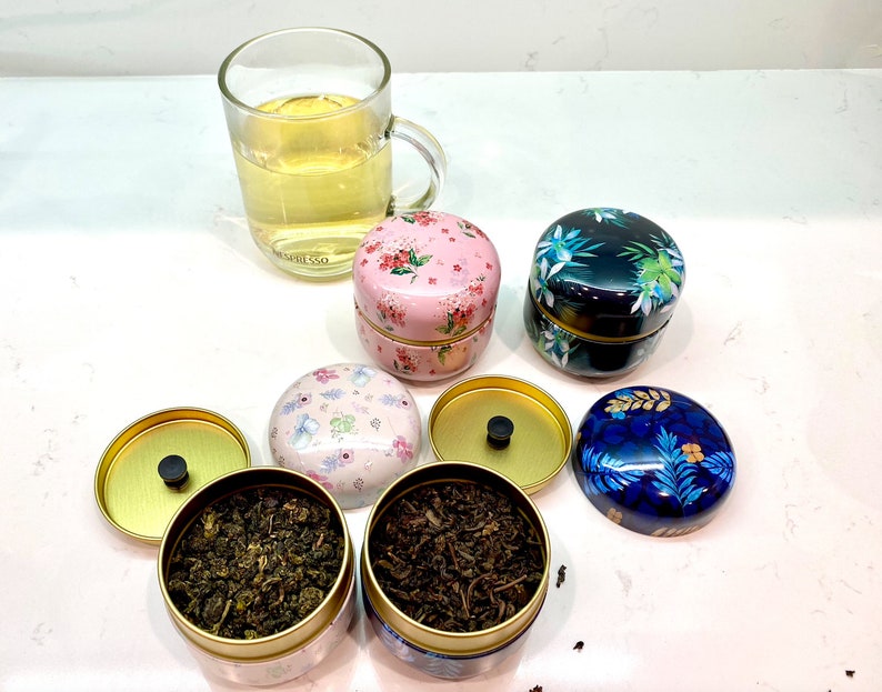 Set of four Metal tea caddies with inner lid image 3