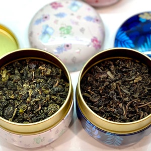 Set of four Metal tea caddies with inner lid image 2