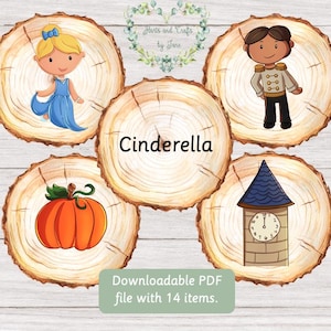 May include: Cinderella-themed illustrations on wooden slices. Depicts Cinderella, a prince, a pumpkin, a clock tower, and the word "Cinderella". The text "Downloadable PDF file with 14 items" is also present.