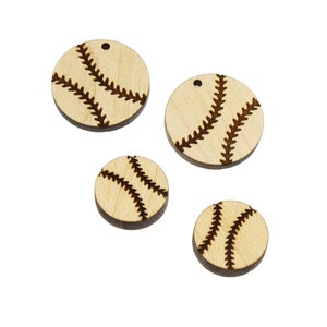 May include: Four wooden baseball ornaments in different sizes. The ornaments are light brown with a dark brown baseball stitch design.