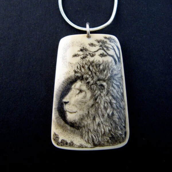 Original Scrimshaw mammoth ivory Lion pendant