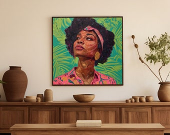 May include: A framed painting of a woman with dark curly hair wearing a pink shirt and a headband. The background is a green and blue tropical leaf pattern.