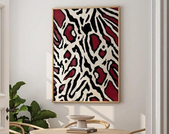 May include: A round wooden dining table with four chairs. The table has a light wood finish and the chairs have a natural wicker seat and back. A black and white abstract art print hangs on the wall behind the table.