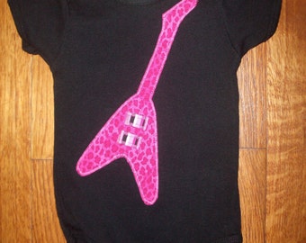 Black Infant Bodysuit with Hot Pink Flying V Guitar Applique